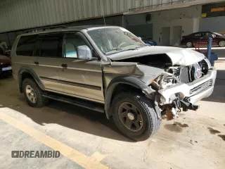 2002 Mitsubishi Montero ES z VIN JA4LS21H32J058330, wystawiony jako Copart lot #83523844 z przebiegiem 186 781 mil mil oraz Szkoda całkowita • Salvage title. Historia ofert i sprzedaży dostępna na DreamBid. Obrazek 4.