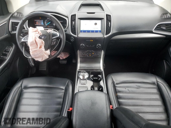 2020 Ford Edge SEL with VIN 2FMPK4J92LBA15448, listed as a Copart auction lot 64000535 with 159,571 mi miles and Salvage title. Bid and sale history available at DreamBid. Image 8.