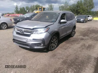 2022 Honda Pilot Touring 7-Passenger with VIN 5FNYF6H60NB013465, listed as a IAAI auction lot 40139627 with 78,161 mi miles. Bid and sale history available at carsss.com. Image 2.