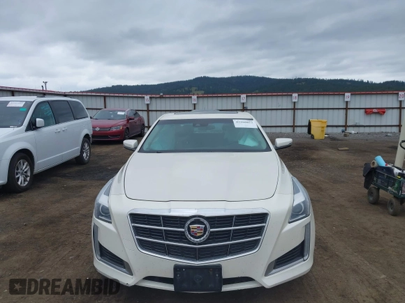 2014 Cadillac CTS Luxury AWD with VIN 1G6AX5S3XE0184524, listed as a IAAI auction lot 42260852 with 139,667 mi miles and . Bid and sale history available at DreamBid. Image 12.