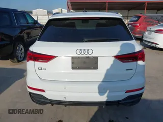 2021 Audi Q3 S line Premium z VIN WA1DECF35M1063868, wystawiony jako IAAI lot #42247128 z przebiegiem 89 959 mil mil oraz . Historia ofert i sprzedaży dostępna na DreamBid. Obrazek 16.