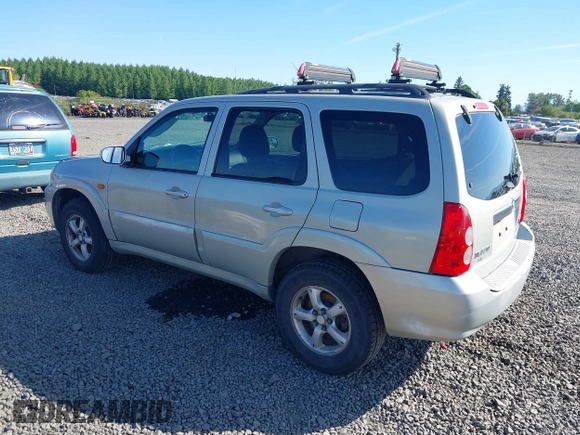 2005 Mazda Tribute S with VIN 4F2CZ96105KM04032, listed as a IAAI auction lot 42157429 with 199,704 mi miles and . Bid and sale history available at carsss.com. Image 3.
