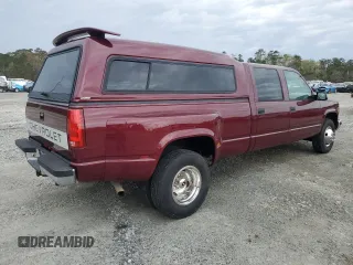 1996 Chevrolet Silverado 3500 z VIN 1GCHC33J4TF013660, wystawiony jako Copart lot #49332785 z przebiegiem 104 424 mil mil oraz Czysty tytuł • Clean title. Historia ofert i sprzedaży dostępna na DreamBid. Obrazek 3.