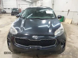 2018 Kia Sportage LX z VIN KNDPMCAC9J7351060, wystawiony jako IAAI lot #42011814 z przebiegiem 174 504 mil mil oraz . Historia ofert i sprzedaży dostępna na DreamBid. Obrazek 12.