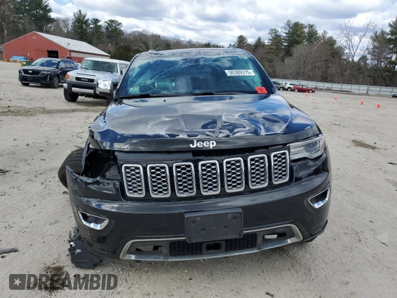 2021 Jeep Grand Cherokee Overland with VIN 1C4RJFCG6MC582917, listed as a Copart auction lot 50389315 with 55,000 mi miles and Salvage title. Bid and sale history available at DreamBid. Image 5.