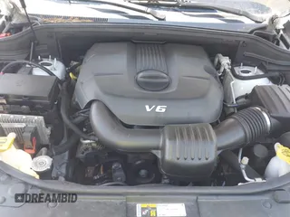 2015 Jeep Grand Cherokee Overland with VIN 1C4RJECG6FC707458, listed as a IAAI auction lot 41996350 with 128,307 mi miles and . Bid and sale history available at DreamBid. Image 10.