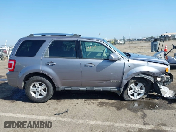 2008 Ford Escape Hybrid z VIN 1FMCU59H08KA05248, wystawiony jako IAAI lot #42193949 z przebiegiem 208 866 mil mil oraz . Historia ofert i sprzedaży dostępna na DreamBid. Obrazek 12.