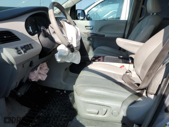 2014 Toyota Sienna Limited with VIN 5TDDK3DC4ES073698, listed as a Copart auction lot 60848915 with 418,121 mi miles and Salvage title. Bid and sale history available at DreamBid. Image 7.