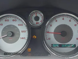 2009 Pontiac G5 GT with VIN 1G2AT18H797147694, listed as a IAAI auction lot 41996093 with 164,747 mi miles. Bid and sale history available at carsss.com. Image 7.