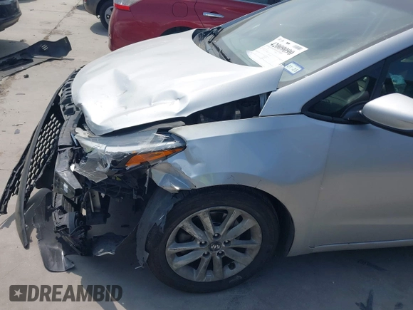 2017 Kia Forte LX with VIN 3KPFL4A79HE152155, listed as a IAAI auction lot 42009090 with 200,084 mi miles and . Bid and sale history available at carsss.com. Image 6.