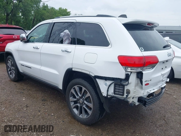2018 Jeep Grand Cherokee Limited with VIN 1C4RJFBG8JC417240, listed as a IAAI auction lot 42476411 with 77,080 mi miles and . Bid and sale history available at DreamBid. Image 3.