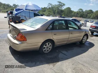 2002 Toyota Avalon XL z VIN 4T1BF28B72U261478, wystawiony jako Copart lot #57638745 z przebiegiem 146 479 mil mil oraz Szkody całkowita. Historia ofert i sprzedaży dostępna na DreamBid. Obrazek 3.