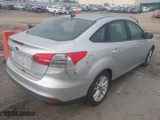 2015 Ford Focus SE with VIN 1FADP3F23FL276810, listed as a IAAI auction lot 41799093 with 127,048 mi miles. Bid and sale history available at carsss.com. Image 4.