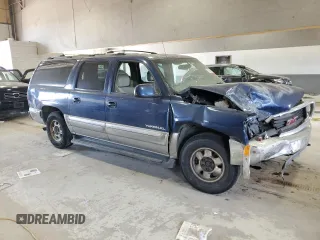 2000 GMC Yukon XL SLT with VIN 1GKFK16T1YJ125157, listed as a Copart auction lot 59906784 with 212,425 mi miles and Salvage Title. Bid and sale history available at carsss.com. Image 4.