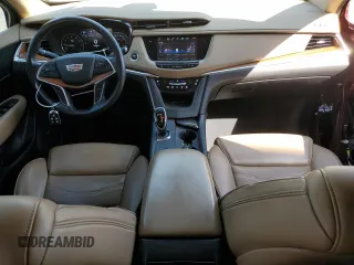 2017 Cadillac XT5 Platinum AWD z VIN 1GYKNFRS8HZ135312, wystawiony jako Copart lot #54057225 z przebiegiem 170 657 mil mil oraz Szkoda całkowita • Salvage title. Historia ofert i sprzedaży dostępna na DreamBid. Obrazek 8.