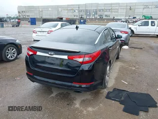 2013 Kia Optima SX with VIN 5XXGR4A64DG207512, listed as a IAAI auction lot 42483528 with 127,748 mi miles and . Bid and sale history available at DreamBid. Image 4.
