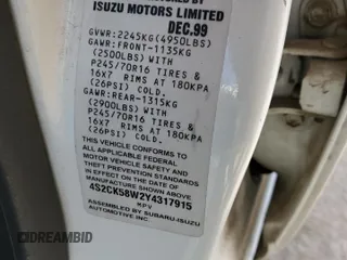 2000 Isuzu Rodeo S z VIN 4S2CK58W2Y4317915, wystawiony jako Copart lot #81780094 z przebiegiem 158 217 mil mil oraz Szkoda całkowita • Salvage title. Historia ofert i sprzedaży dostępna na DreamBid. Obrazek 14.