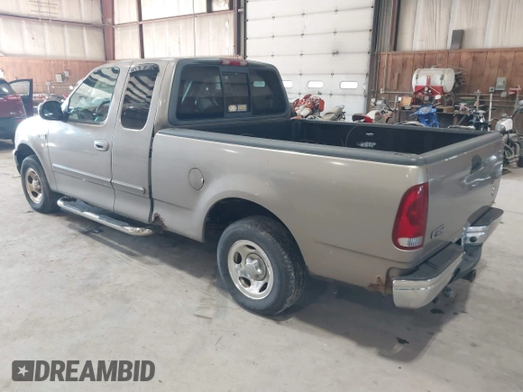 2001 Ford F-150 XL z VIN 1FTZX17241NB44865, wystawiony jako IAAI lot #42033863 z przebiegiem 145 072 mil mil oraz . Historia ofert i sprzedaży dostępna na DreamBid. Obrazek 3.