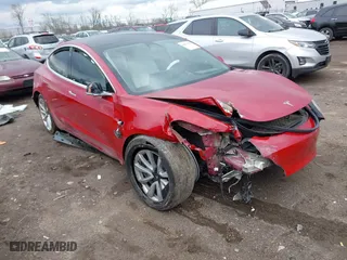 2019 Tesla Model 3 Long Range with VIN 5YJ3E1EB9KF365960, listed as a IAAI auction lot 41877026 with 59,101 mi miles. Bid and sale history available at carsss.com. Image 1.