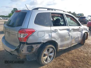 2015 Subaru Forester 2.5i with VIN JF2SJABC5FH487212, listed as a IAAI auction lot 42006703 with 143,895 mi miles and . Bid and sale history available at DreamBid. Image 4.