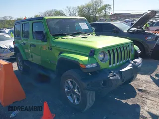 2019 Jeep Wrangler Unlimited Sahara with VIN 1C4HJXEN1KW592876, listed as a IAAI auction lot 42039474 with 66,506 mi miles and . Bid and sale history available at DreamBid. Image 1.