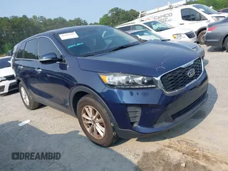2019 Kia Sorento LX z VIN 5XYPG4A35KG523120, wystawiony jako IAAI lot #42389349 z przebiegiem 113 852 mil mil oraz . Historia ofert i sprzedaży dostępna na DreamBid. Obrazek 1.