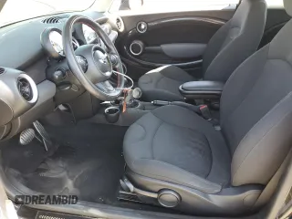 2011 MINI Hardtop S with VIN WMWSV3C57BTY16043, listed as a Copart auction lot 59337575 with 84,617 mi miles and Salvage title. Bid and sale history available at DreamBid. Image 7.