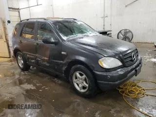 1999 Mercedes-Benz M-Class with VIN 4JGAB54E3XA101177, listed as a Copart auction lot 78703184 with 236,957 mi miles and Salvage Title. Bid and sale history available at carsss.com. Image 4.