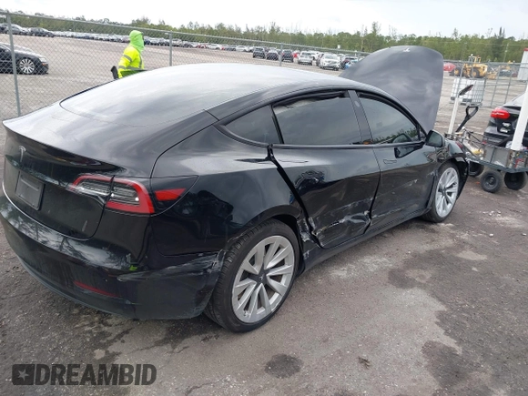 2023 Tesla Model 3 z VIN 5YJ3E1EA4PF433466, wystawiony jako IAAI lot #42249247 z przebiegiem 39 808 mil mil oraz . Historia ofert i sprzedaży dostępna na DreamBid. Obrazek 4.