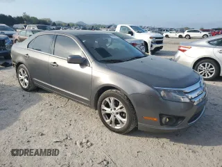 2012 Ford Fusion SE with VIN 3FAHP0HG8CR187773, listed as a Copart auction lot 51839835 with 183,236 mi miles and Clean Title. Bid and sale history available at DreamBid. Image 4.