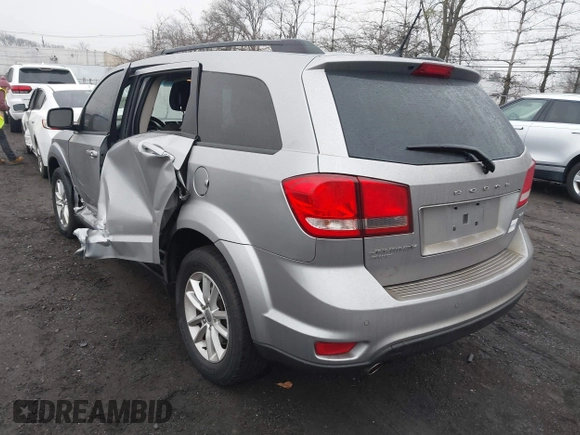 2016 Dodge Journey SXT with VIN 3C4PDDBG2GT242127, listed as a IAAI auction lot 41485555 with 119,728 mi miles. Bid and sale history available at carsss.com. Image 3.
