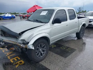2003 Toyota Tacoma PreRunner z VIN 5TEGN92N13Z295384, wystawiony jako IAAI lot #42406105 z przebiegiem 194 171 mil mil oraz . Historia ofert i sprzedaży dostępna na DreamBid. Obrazek 2.