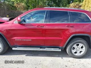 2014 Jeep Grand Cherokee Altitude with VIN 1C4RJFAG3EC477952, listed as a IAAI auction lot 40446154 with 35,573 mi miles. Bid and sale history available at carsss.com. Image 14.