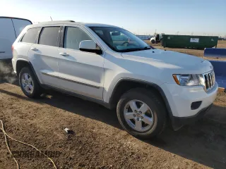 2011 Jeep Grand Cherokee Laredo with VIN 1J4RR4GG4BC640277, listed as a Copart auction lot 52166205 with 195,877 mi miles and Salvage Title. Bid and sale history available at DreamBid. Image 4.