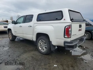 2016 GMC Canyon 4WD SLT with VIN 1GTP6DE11G1266217, listed as a Copart auction lot 82195694 with 129,578 mi miles and Clean Title. Bid and sale history available at carsss.com. Image 2.