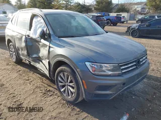2018 Volkswagen Tiguan S with VIN 3VV0B7AX1JM123627, listed as a IAAI auction lot 41455998 with 92,950 mi miles and . Bid and sale history available at DreamBid. Image 1.