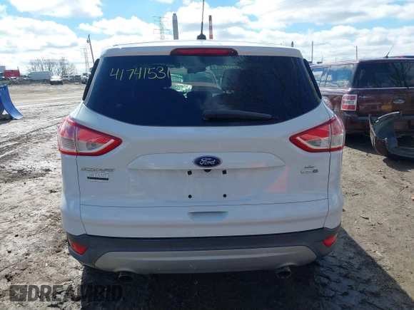 2015 Ford Escape SE with VIN 1FMCU9GX5FUB15747, listed as a IAAI auction lot 41741531 with 95,027 mi miles. Bid and sale history available at carsss.com. Image 16.