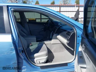 2014 Toyota Camry Hybrid LE with VIN 4T1BD1FK7EU098824, listed as a IAAI auction lot 42063119 with 112,759 mi miles. Bid and sale history available at carsss.com. Image 5.