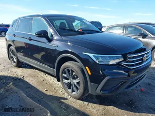 2023 Volkswagen Tiguan SE with VIN 3VVMB7AX7PM032629, listed as a IAAI auction lot 41441468 with 52,518 mi miles. Bid and sale history available at carsss.com. Image 1.
