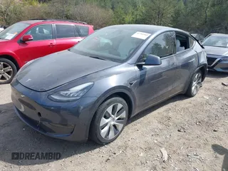 2022 Tesla Model Y Long Range z VIN 7SAYGDEE2NF447998, wystawiony jako IAAI lot #41704968 z przebiegiem 34 088 mil mil oraz . Historia ofert i sprzedaży dostępna na DreamBid. Obrazek 19.