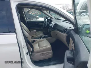 2017 Honda Pilot Touring with VIN 5FNYF6H95HB094641, listed as a IAAI auction lot 41531652 with 97,615 mi miles. Bid and sale history available at carsss.com. Image 5.