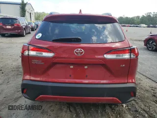 2023 Toyota Corolla Cross LE z VIN 7MUCAAAG5PV064608, wystawiony jako Copart lot #51744375 z przebiegiem 18 031 mil mil oraz Szkody całkowita. Historia ofert i sprzedaży dostępna na DreamBid. Obrazek 6.