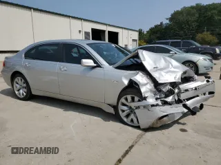 2004 BMW 7 Series 745Li with VIN WBAGN63444DS47664, listed as a Copart auction lot 71046044 with 144,598 mi miles and Salvage title. Bid and sale history available at DreamBid. Image 4.