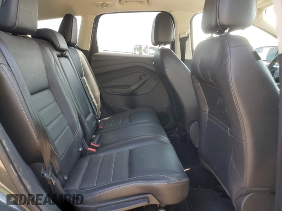 2016 Ford Escape Titanium with VIN 1FMCU9J98GUB32375, listed as a Copart auction lot 59564885 with 123,548 mi miles and Salvage title. Bid and sale history available at DreamBid. Image 10.