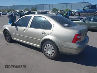 2004 Volkswagen Jetta GL z VIN 3VWRA69M64M039222, wystawiony jako IAAI lot #42262445 z przebiegiem 100 200 mil mil oraz . Historia ofert i sprzedaży dostępna na DreamBid. Obrazek 3.