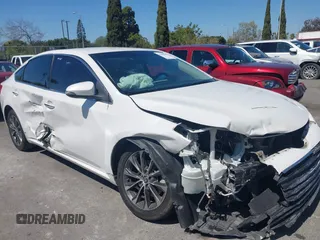 2016 Toyota Avalon Limited with VIN 4T1BK1EB4GU216774, listed as a IAAI auction lot 41861690 with 113,153 mi miles and . Bid and sale history available at carsss.com. Image 6.