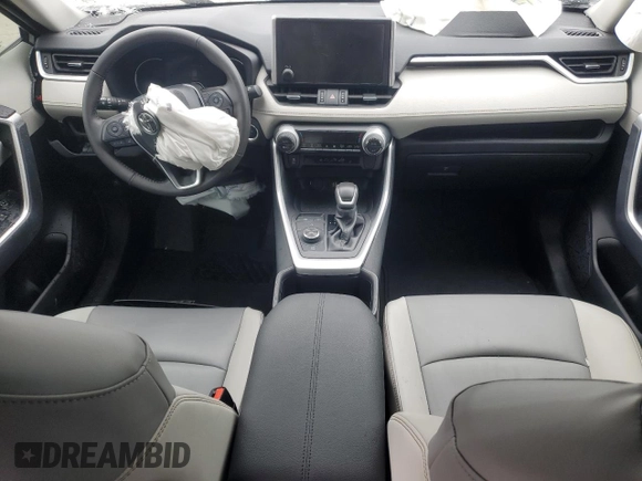 2024 Toyota RAV4 Hybrid XLE Premium with VIN 4T3B6RFV9RU167402, listed as a Copart auction lot 89083875 with 5,923 mi miles and Salvage Title. Bid and sale history available at DreamBid. Image 8.