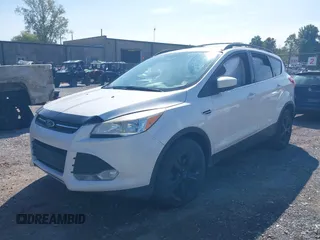 2013 Ford Escape SE with VIN 1FMCU9GXXDUB66562, listed as a IAAI auction lot 40287024 with 120,398 mi miles. Bid and sale history available at carsss.com. Image 2.