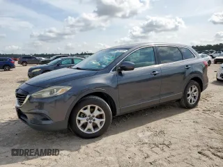 2015 Mazda CX-9 Touring z VIN JM3TB3CA7F0450628, wystawiony jako Copart lot #60561465 z przebiegiem 137 919 mil mil oraz Czysty tytuł • Clean title. Historia ofert i sprzedaży dostępna na DreamBid. Obrazek 1.