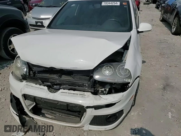 2009 Volkswagen GTI z VIN WVWFV71K29W121109, wystawiony jako Copart lot #70344254 z przebiegiem 102 475 mil mil oraz Szkoda całkowita • Salvage title. Historia ofert i sprzedaży dostępna na DreamBid. Obrazek 13.